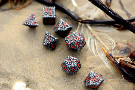 Hymgho Pile of Skulls Metal Dice - Dark Metal with Red Font Set (7)