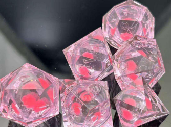 Sharp Edge Glow in the Dark Liquid Core RPG Dice Set - Radiant Pink
